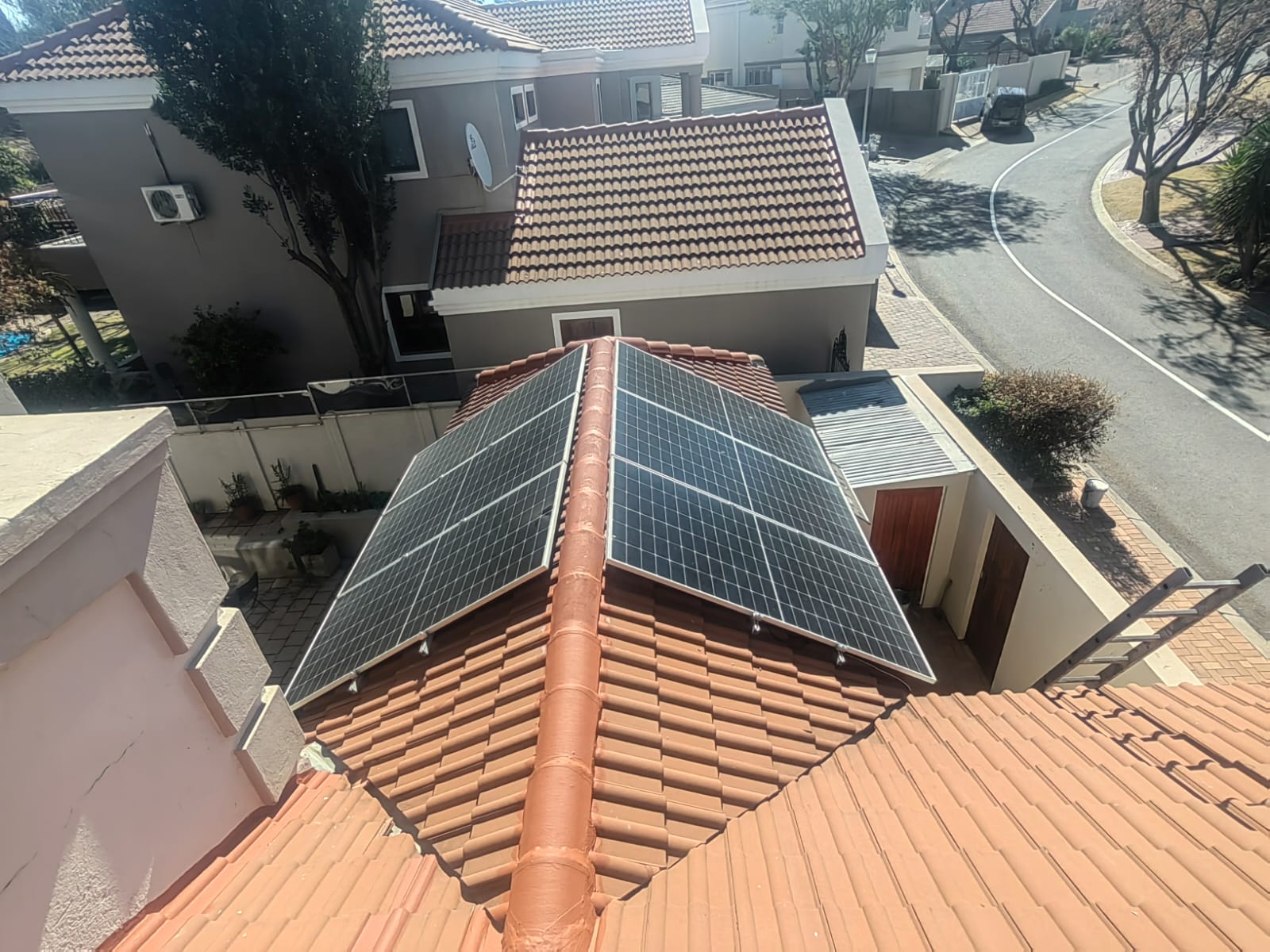 Tiled roof repairs around solar panels